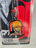 Anime character keychain with 'Bleach' branding on a red and black background