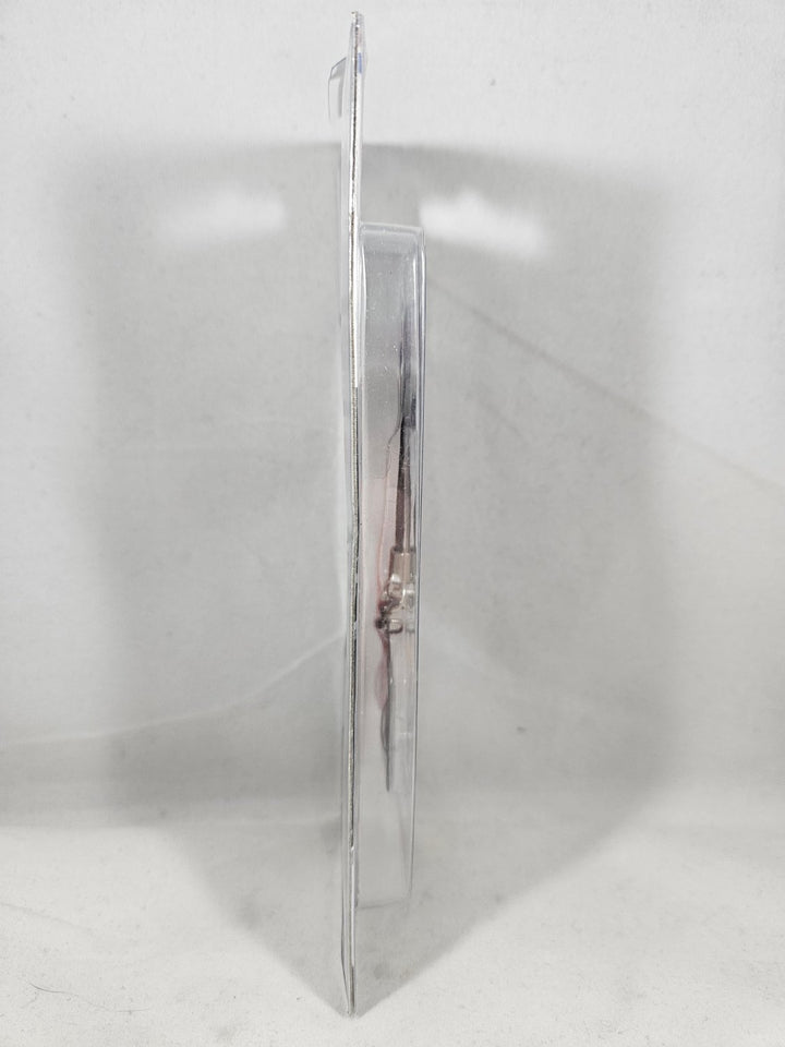 Metallic object on a white background