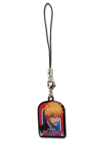 A metal cell phone charm featuring an anime character in a red and blue outfit on a white background.