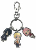 A metal keychain featuring three anime character charms on a plain white background.