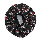 Bottom of Black Sleep cap with cartoon character pattern on a white background