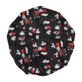 Top view of Black sleep cap with cartoon character pattern on a white background