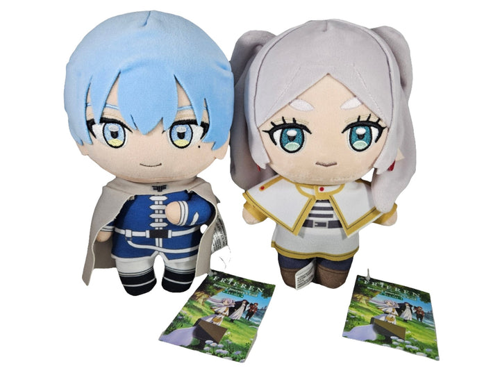 Two plush toys with character designs and promotional cards on a white background