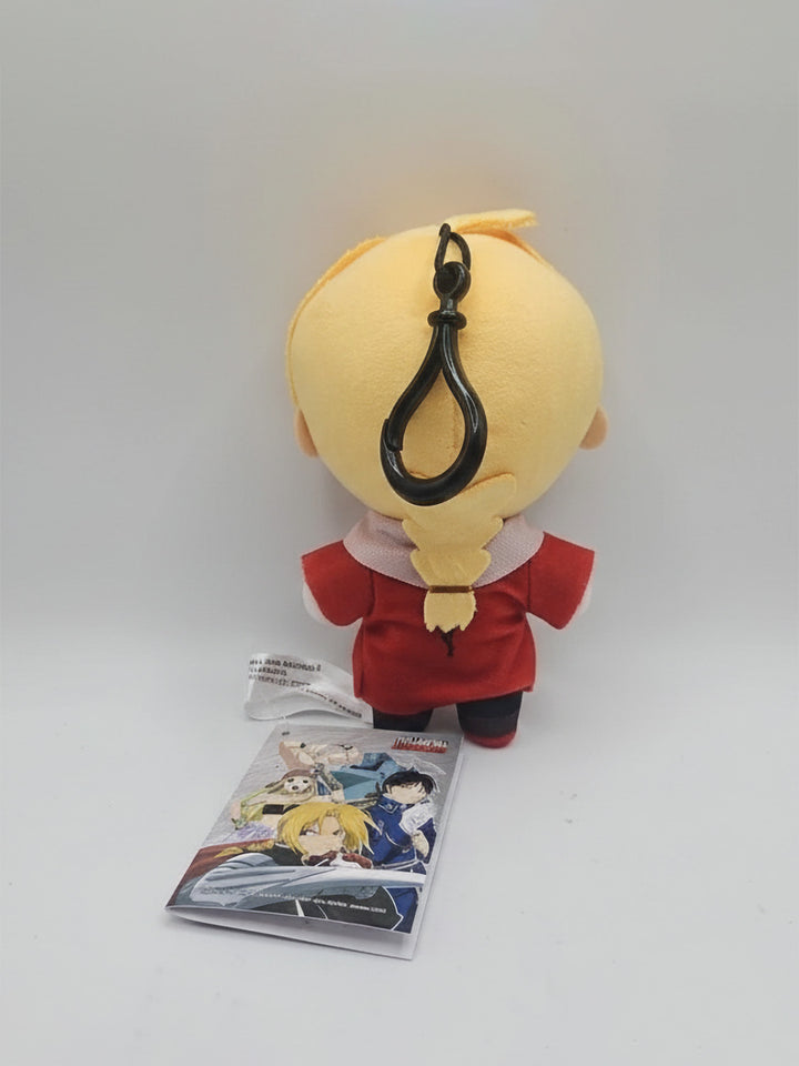 Plush toy with a character design on a white background
