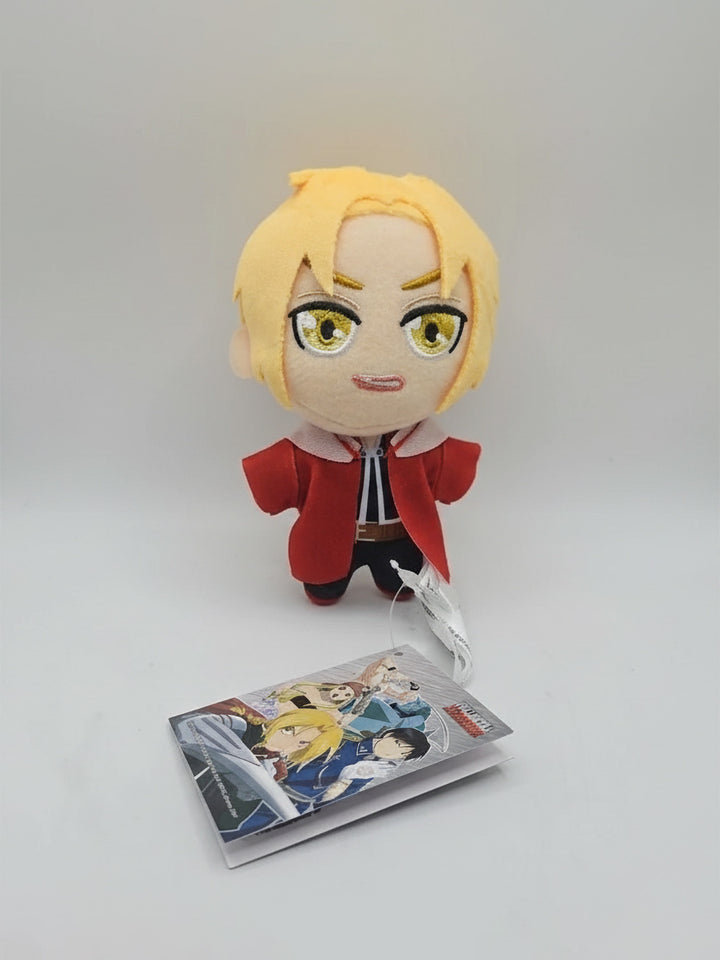 Plush toy of an animated character with tag featuring multiple characters on a white background