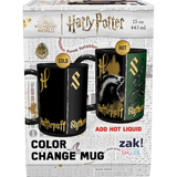 Harry Potter color change mug in its retail packaging, showing both the cold black state and the hot green state of the mug with gold Slytherin details.