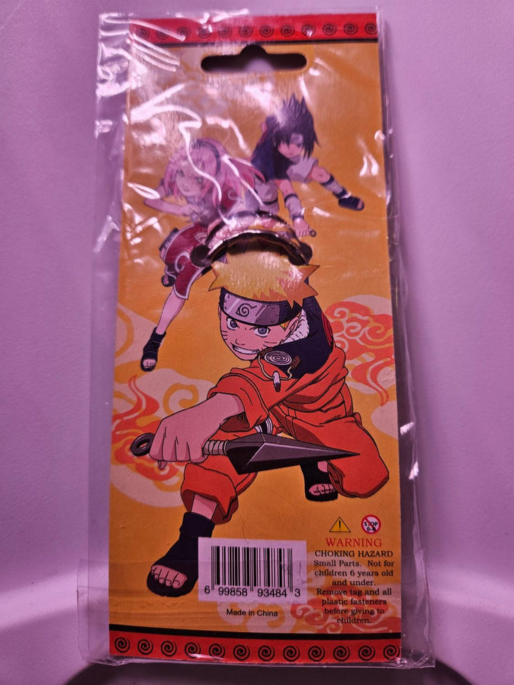 Anime character packaging with orange background and character illustration.