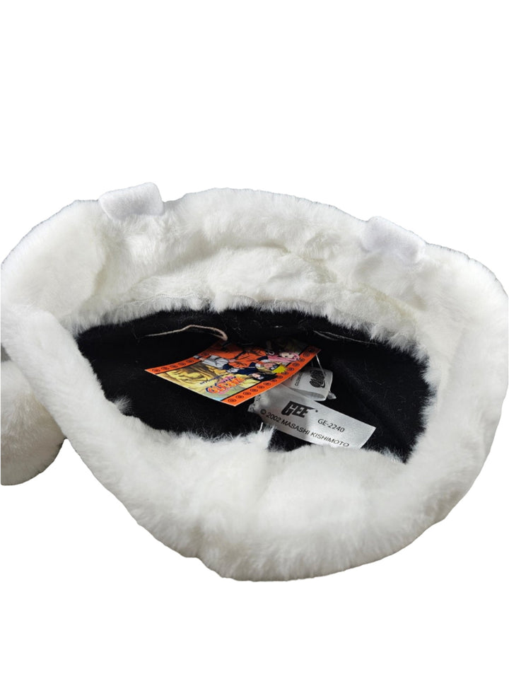 White fluffy Naruto sleeping hat bottom with a tag on a white background