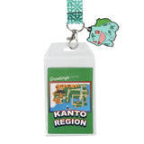 Lanyard with a badge holder featuring a map of Kanto Region from Pokémon and a Bulbasaur charm on a white background.