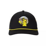 A black trucker-style cap featuring a yellow embroidered Pikachu character patch on the front, with a thin yellow piping accent along the brim.