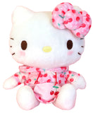 Plush toy of Hello Kitty character with cherry design hoodie and bow on a white background