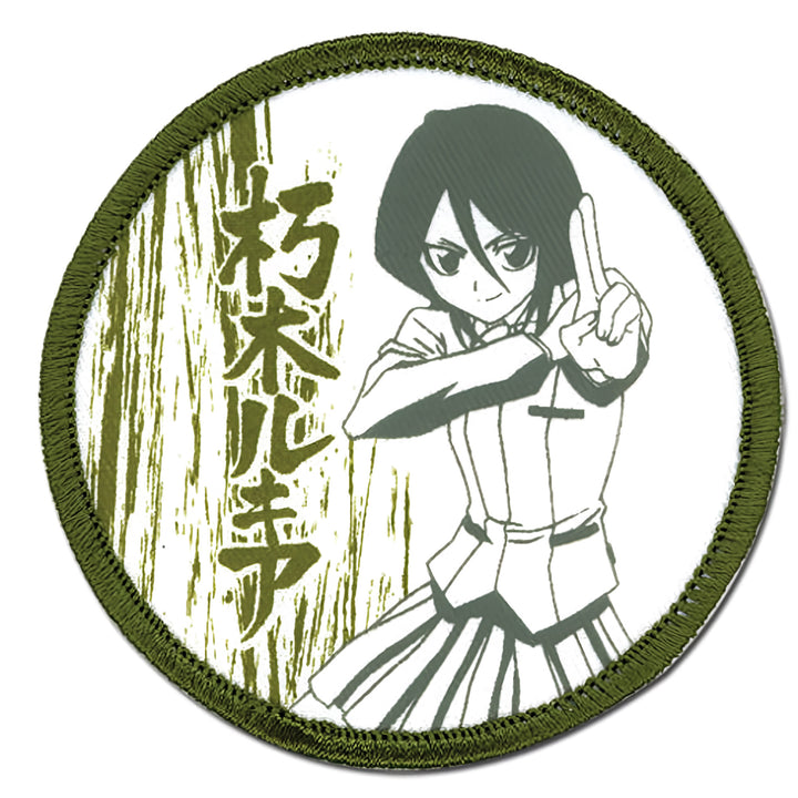 Circular patch with an anime-style character in a martial arts pose and Japanese text on a white background.