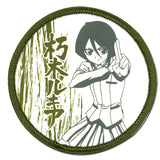 Circular patch with an anime-style character in a martial arts pose and Japanese text on a white background.