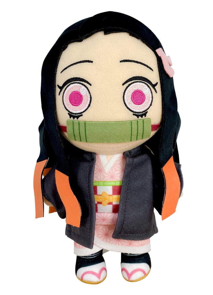 Demon Slayer Nezuko Kamado 8-inch SD chibi plush doll front view showing black hair pink flower accessory embroidered pink eyes green bamboo muzzle pink floral kimono black haori with orange flame lining and black zori sandals officially licensed by Great Eastern Entertainment