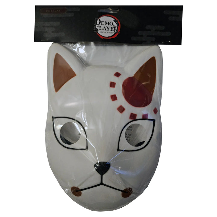 Close-up of Tanjiro Kamado’s white fox warding mask showing red forehead markings, outlined eye openings, a black nose, and curved mouth lines through clear packaging, Demon Slayer by Great Eastern Entertainment.