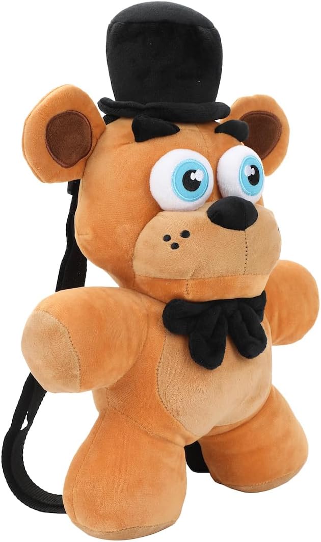 Plush toy bear with a top hat and bow tie on a white background
