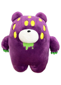 A fuzzy purple plush toy resembling a bear with yellow eyes on its head and body. It has a cute, round white nose and green drool on its chest.