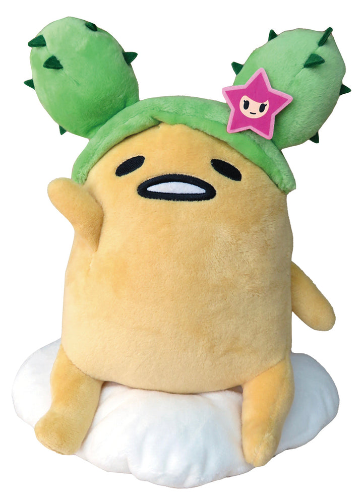 A yellow plush toy resembling an egg yolk with a cactus headband and a pink star accessory.