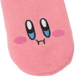 Pink sock featuring a cute, smiling character face with big, expressive blue eyes and rosy cheeks. The knitted texture adds a cozy feel.