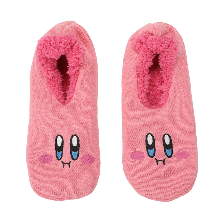 Pink slippers with cartoon faces, featuring big eyes and rosy cheeks. The cozy interior is lined with plush, creating a playful and warm vibe.