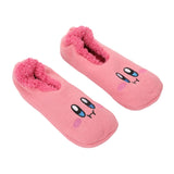 Pink slippers with a cute, cartoon face design, including large eyes and blushing cheeks. The interior is lined with soft, fluffy material.