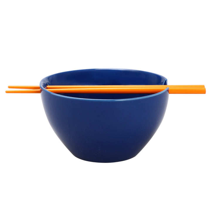 Naruto Uzumaki ceramic ramen bowl side view showing navy blue exterior glaze and orange chopsticks resting in built-in chopstick holder slot on rim by Bioworld