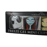 Angled close-up of Disney Nightmare Before Christmas freeze gel mini cups retail box showing Jack Skellington cup on black background and Sally cup on purple background inside black packaging window with Disney Tim Burtons The Nightmare Before Christmas logo and Freeze Gel Mini Cups text