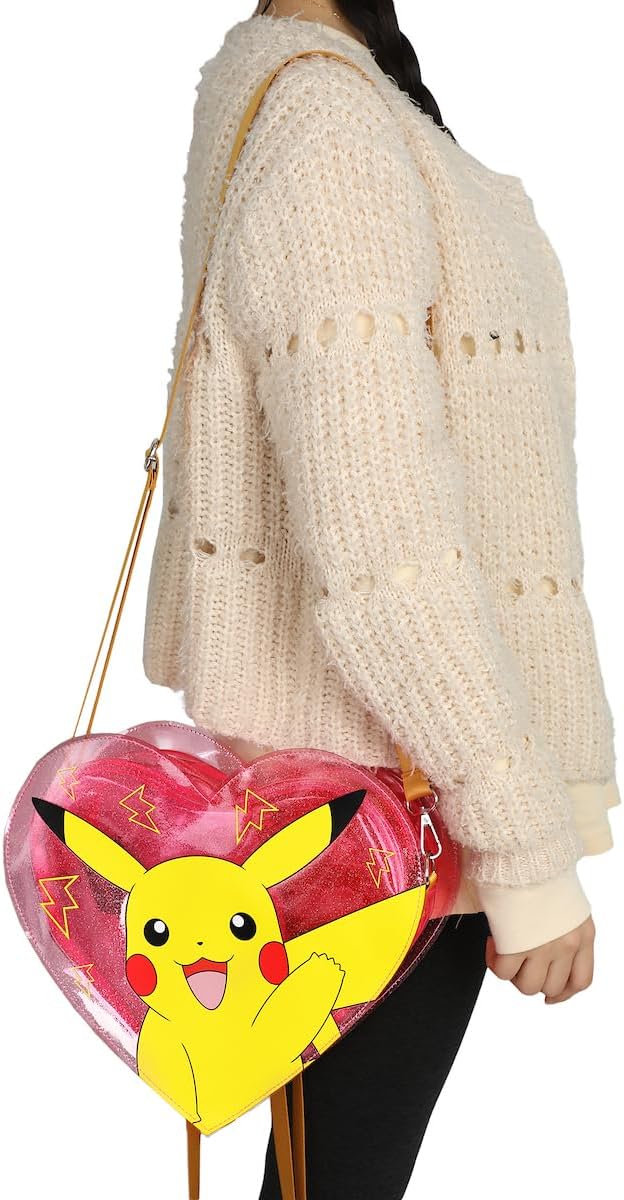 Person wearing a white sweater with a heart-shaped Pikachu backpack.