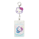 Hello Kitty retractable badge holder with metal clasp and clear plastic sleeve.