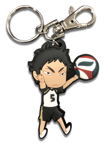 A key chain featuring the anime character Keiji Akaashi from Haikyuu!!, holding a volleyball, predominantly in black and white colors with a silver keyring.