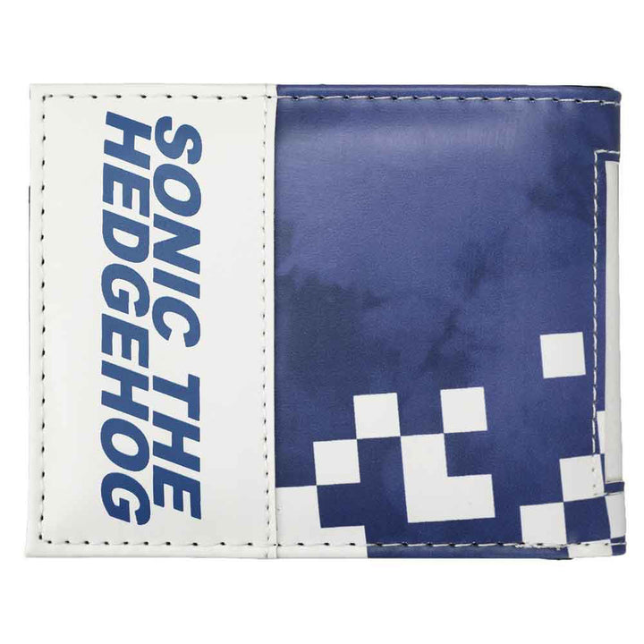 Back view of Sonic The Hedgehog Bi-fold Wallet showing split design with Sonic The Hedgehog text printed vertically on white left panel and solid navy blue right panel with white pixel checkerboard accent officially licensed by Bioworld under Sega